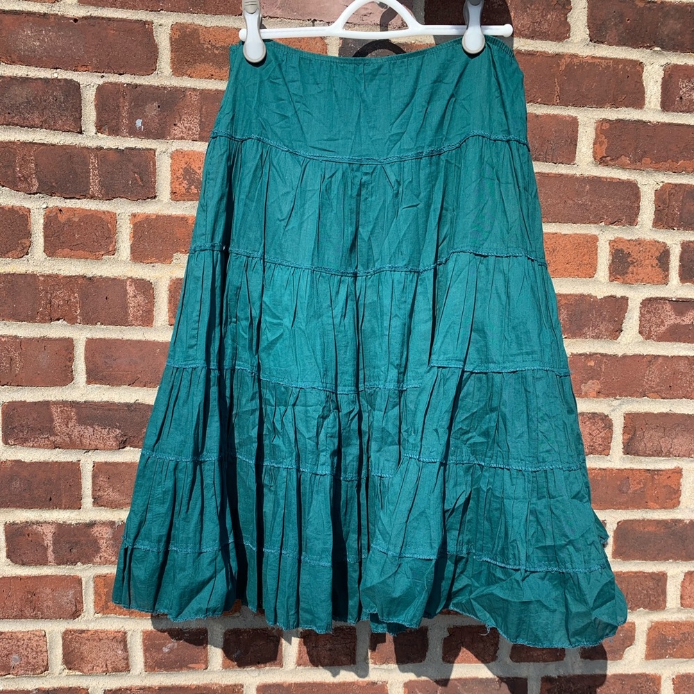 Turquoise large fluffy midi skirt.